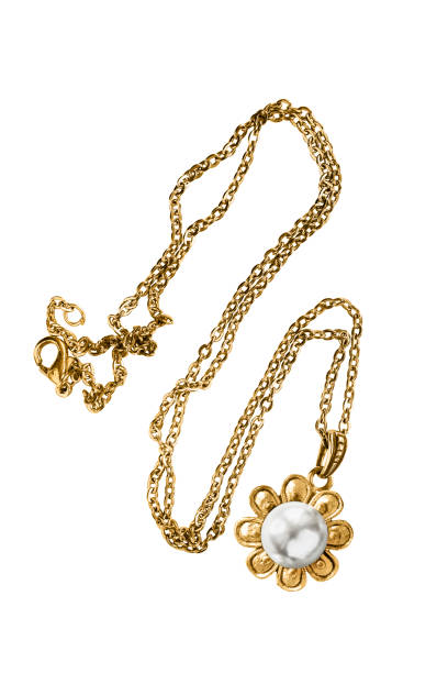 istock Gold necklace isolated 1289163977