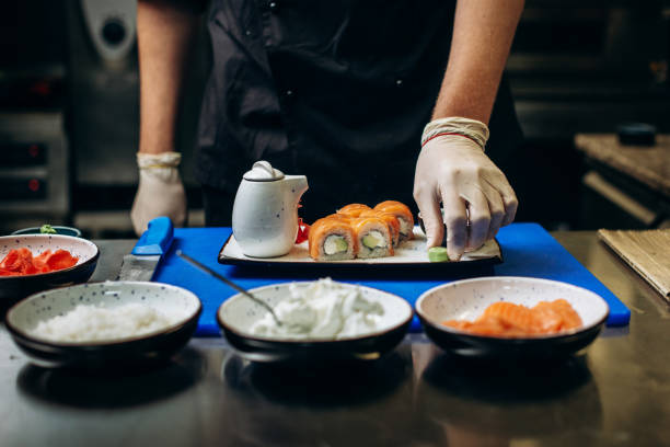 istock Cooking sushi in a japanese restaurant 1289165082