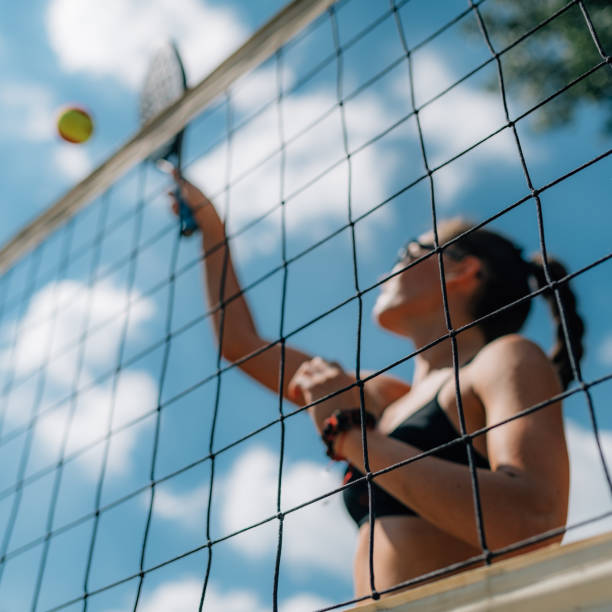 istock Beach Tennis Player at the Net 1289166730