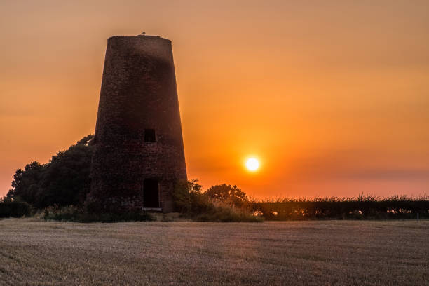 istock Sunset at derelict windmill, York, North Yorkshire, England, Britain 1289168179