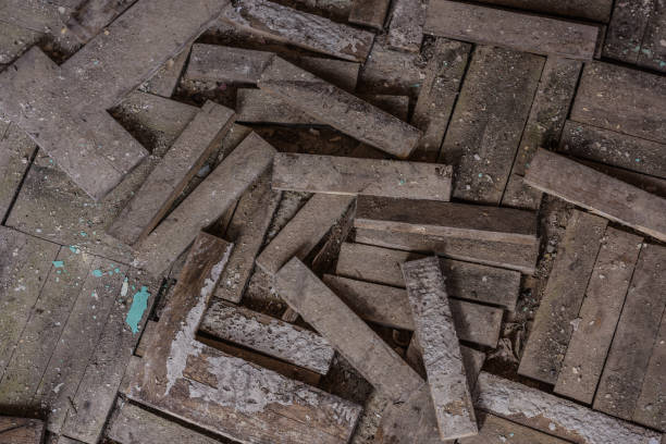 istock crumbled parquet floor in a abandoned house 1289171939