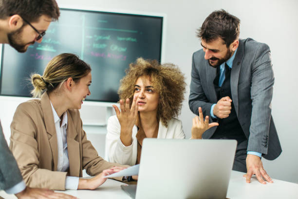 istock Group of business people working inside modern office 1289172168