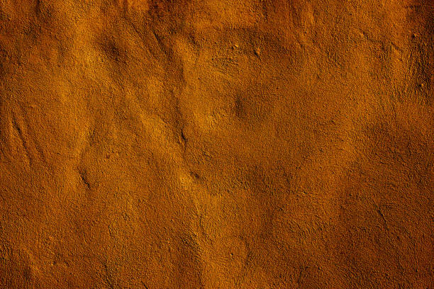 istock Copper colored wall texture background with textures of different shades of copper or bronze 1289173024
