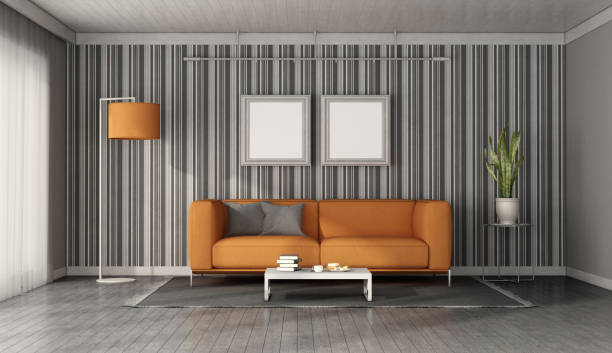 istock Orange sofa in a modern living room 1289174354