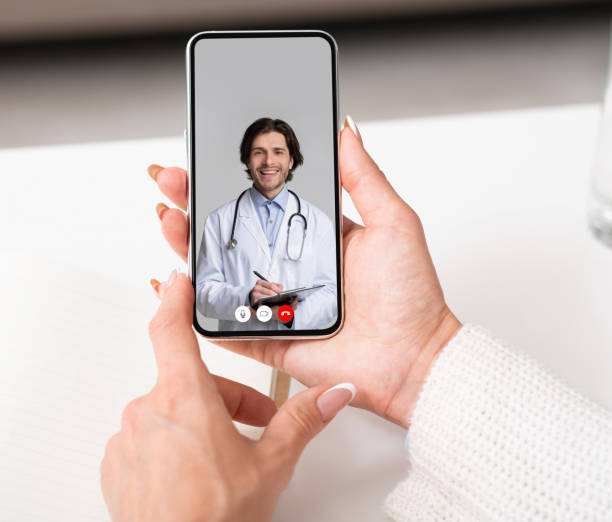 istock Lady Talking With Doctor Via Video Call On Smartphone Indoor 1289176968