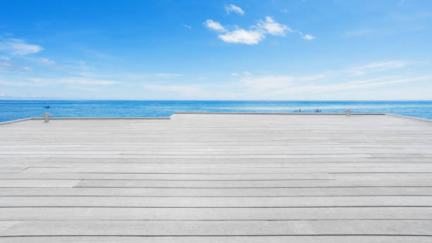 istock Wooden jetty on the tropical sea 1289177062