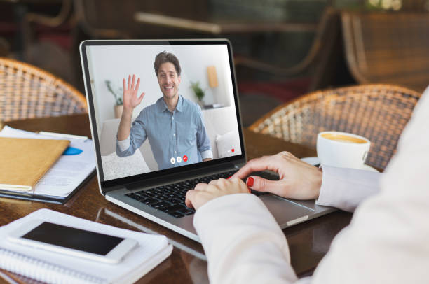 istock Unrecognizable lady freelancer calling her husband via laptop, collage 1289177125
