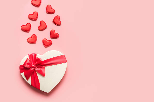 istock Valentine's Day card white box with red little hearts. 1289179962