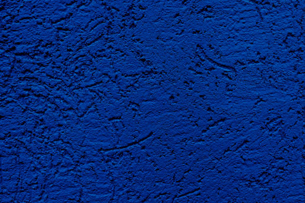 istock The wall is made of plaster. Rough surface. Solid color abstract background. 1289185221