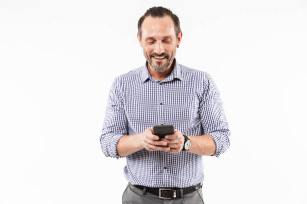 istock Happy adult man using mobile phone. 1289187900