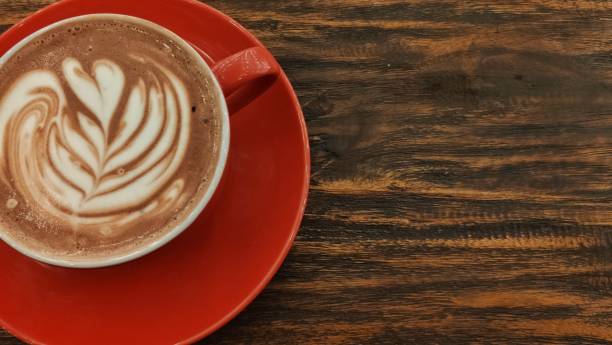 istock A cup of coffee on a wooden table 1289190368