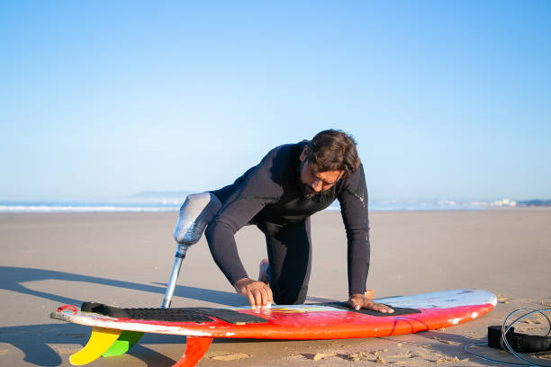 istock Sporty man in wetsuit 1289193481