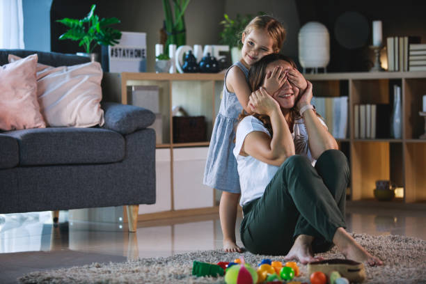 istock Guess who is behind you mom! 1289195618