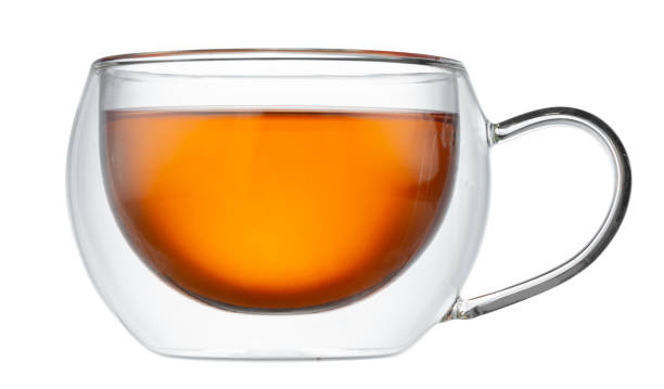 istock Glass cup of tea isolated on white background 1289196410