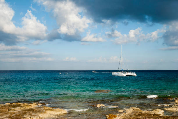 Cozumel Island Shore With Catamaran stock photo