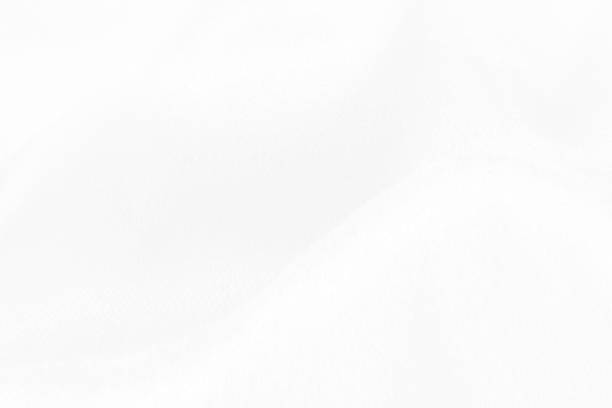 istock White cloth background abstract. Fabric is wrinkled and sofe wave. Material are used in textile assembly. 1289200405