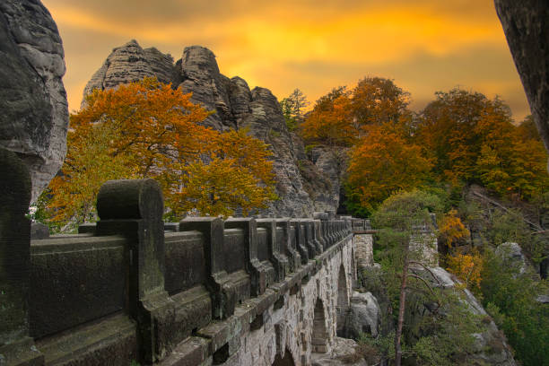 The Bastion with the Bastei Bridge in Saxon Switzerland is a unique natural wonder in The Bastei with the Bastei Bridge in Saxon Switzerland is a unique natural wonder in
Germany festung konigstein castle stock pictures, royalty-free photos & images