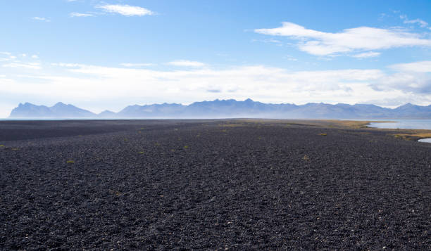 istock Hvalnes peninsula with a black pebble beach. East Iceland. 1289203748