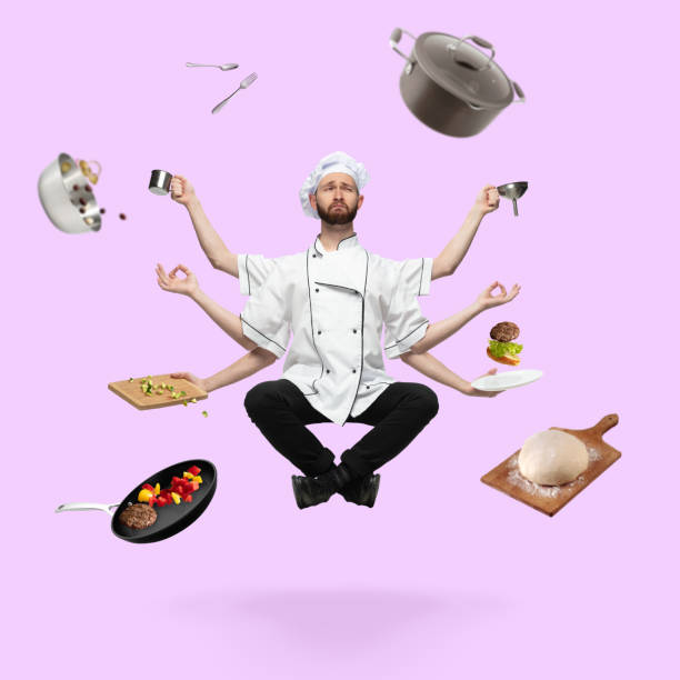 Handsome multi-armed chief-cooker levitating isolated on pink studio background with equipment. Multitask concept.