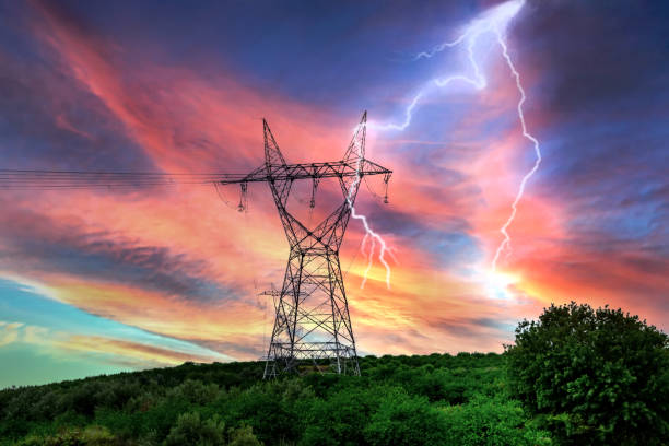 istock High voltage electricity pylons and transmission power lines 1289206079