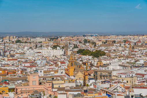 SEVILLE, SPAIN - OCTOBER 17, 2020: City skyline of Sevilla aerial view from the top of Cathedral of Saint Mary of the See, Seville Cathedral , Andalusia, Spain