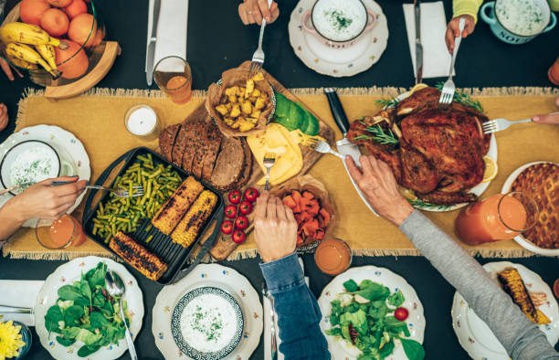 istock Overhead view of table during Christmas dinner 1289211943