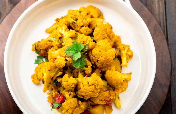 istock Indian style cauliflower with potatoes or aloo gobhi 1289217106