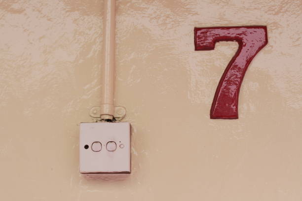 istock photo of the socket and number on the wall 1289217467