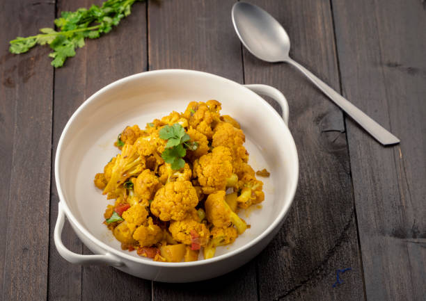 istock Indian style cauliflower with potatoes or aloo gobhi 1289217555