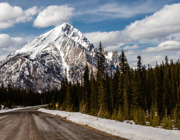 istock Mountains from the car. Spray Valley Provincial Park. Alberta, Canada 1289217636