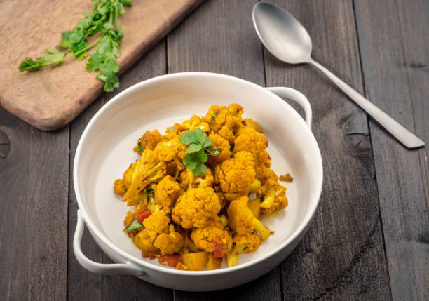 istock Indian style cauliflower with potatoes or aloo gobhi 1289217674