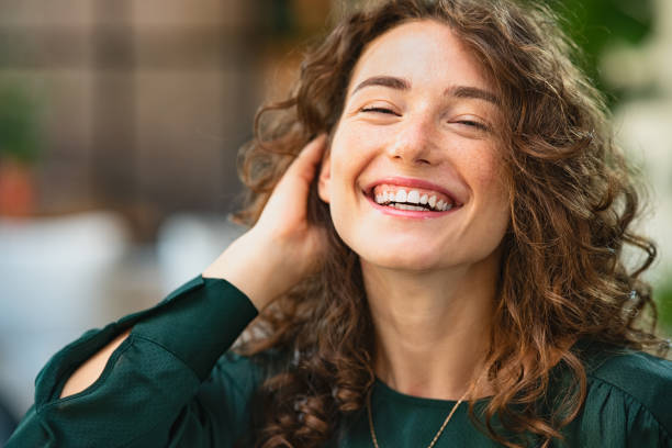 istock Young beautiful woman laughing 1289220668