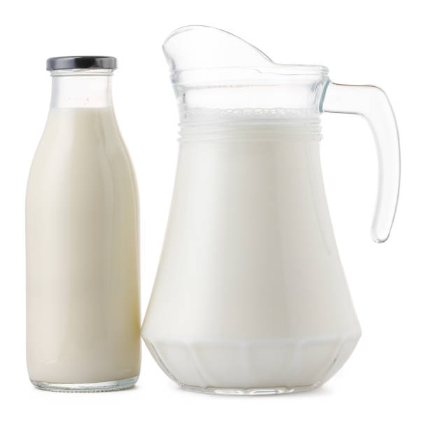 istock Glassware full of fresh milk isolated on white 1289220964