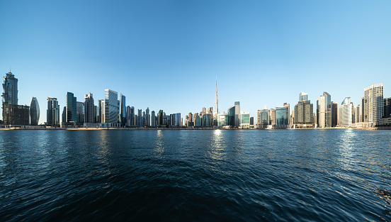 Panoramic views of urban Skyline and modern skyscrapers in Dubai UAE.