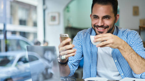 istock Cheerful man messaging on smartphone 1289223734