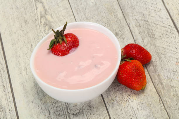 istock Yoghurt with strawberry in the bowl 1289223975