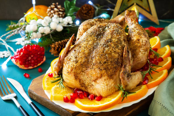 istock Christmas dinner, winter Holiday table. Baked turkey with spice. 1289227464