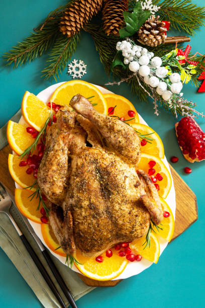 istock Christmas dinner, winter Holiday table. Baked turkey with spice.  Top view flat lay. 1289227477