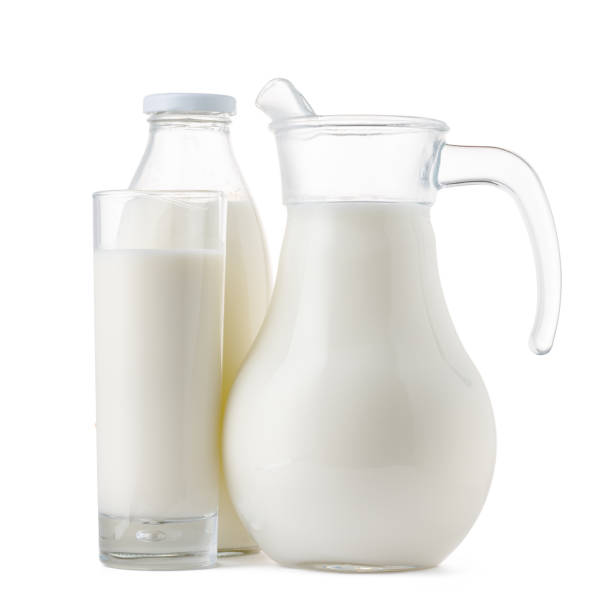 istock Glassware full of fresh milk isolated on white 1289228783