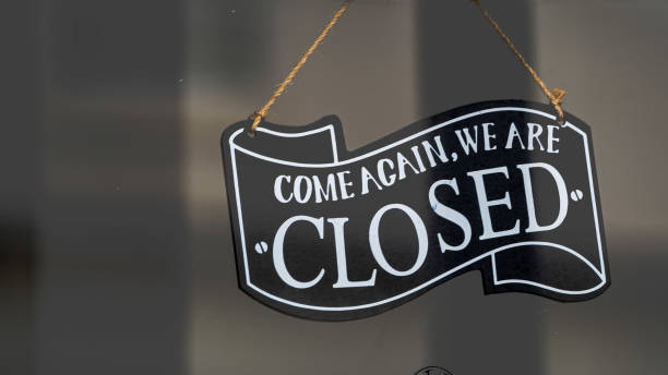 istock Come again we are closed sign in a shop window 1289229658