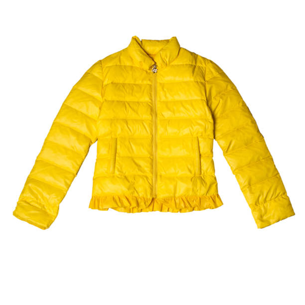 giacca autunnale calda per ragazze in giallo. orientamento orizzontale - giacca a vento foto e immagini stock