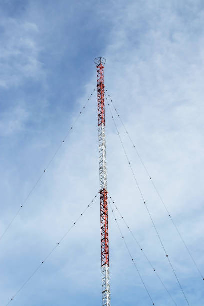 istock Radio communication mast with supporting guy-wires. 1289234517