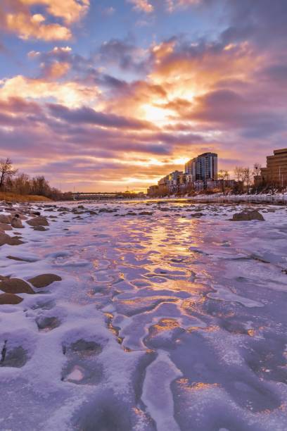 istock Sunrise Sky Over A Frozen Bow River 1289236340