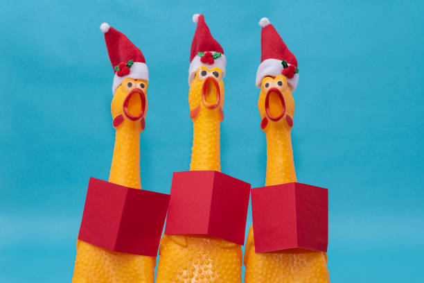 istock Three rubber chickens with Santa Claus hats 1289239026