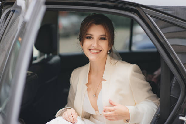 istock The bride gets out of the car. 1289239108