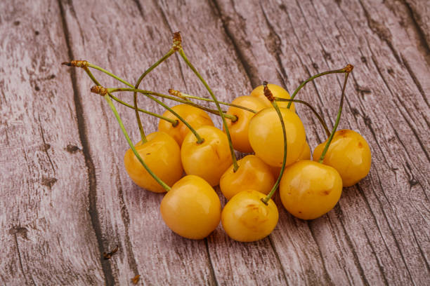 istock Sweet ripe yellow cherry heap 1289241167