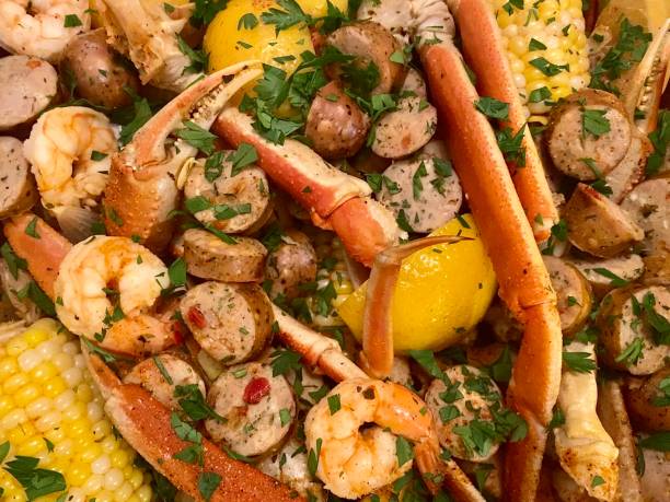 Seafood Boil Seafood Boil background crab seafood photos stock pictures, royalty-free photos & images