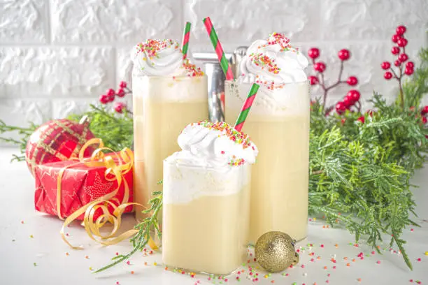 Christmas Sugar Cookie White Russian Cocktail.Xmas White Russian recipe, with whipped dream, Sugar Cookie Vanilla milkshake with crispy cookies and Sugar decor