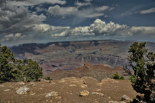 One of the Natural wonders of the World is the Grand Canyon National Park, this location under a very cloudy sky is a part of many great views wherever you look.