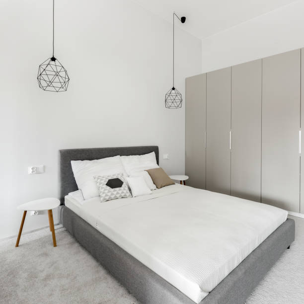 istock White bedroom with big wardrobe 1289253805